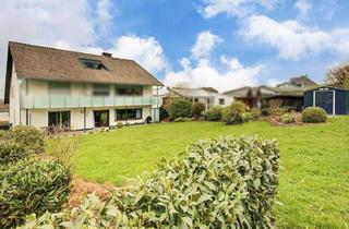 Wohnung kaufen in 57627 Hachenburg, Attraktive, großzügige Gartenwohnung mit Doppelgarage im ruhigen Wohngebiet von Hachenburg!