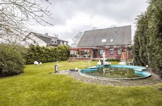 Haus kaufen in 27612 Loxstedt, Loxstedt-Stinstedt: Attraktives Zweifamilienhaus mit Wintergarten und Außenpool