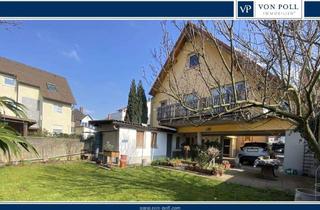 Mehrfamilienhaus kaufen in 65451 Kelsterbach, Geräumiges Mehrfamilienhaus mit großem Innenhof und Anbau