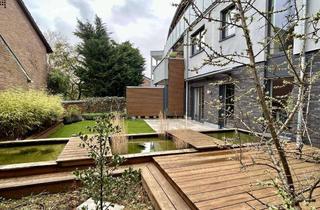 Haus kaufen in 46397 Bocholt, Stadthaus mit schön angelegtem Garten und Tiefgaragenstellplatz