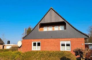 Haus kaufen in 26532 Großheide, Großheide - EinZweifamilienhaus zu verkaufen