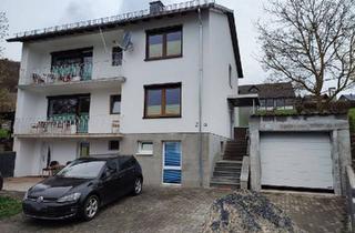 Haus kaufen in 35719 Angelburg, Angelburg - 2,5 Familien Haus mit KellerGarage und schönem Grundstück