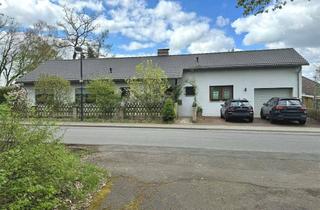 Haus kaufen in 53604 Bad Honnef, Freistehender Satteldachbungalow in naturverbundener Wohnlage von Bad Honnef-Aegidienberg