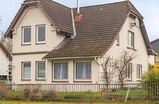Haus kaufen in 24635 Rickling, Charmantes Zweifamilienhaus mit vielseitigem Potenzial