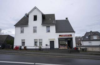 Mehrfamilienhaus kaufen in 58256 Ennepetal, Freistehendes Mehrfamilienhaus mit Gewerbe und Garagen