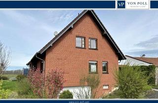 Haus kaufen in 35321 Laubach, Wohn Idee - familienfreundliches Haus in ruhiger Feldrandlage