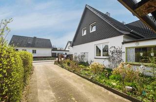 Doppelhaushälfte kaufen in 24837 Schleswig, Charmante Doppelhaushälfte mit Garage in Schleswig