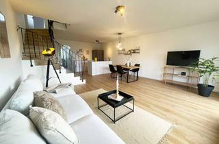Wohnung kaufen in 63741 Nilkheim, Exklusiver 4-Zimmer-Wohntraum in Top-Lage mit großem Balkon und Garage