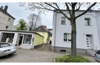 Haus kaufen in 44577 Castrop-Rauxel, Solide Kapitalanlage - 4 Familienhaus & Gewerbe in Castrop-Rauxel zu verkaufen.
