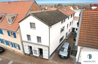 Haus kaufen in 55268 Nieder-Olm, Vielseitiges Familienhaus mit vermieteter Bürofläche in Nieder-Olm! Wohnen & Arbeiten im Zentrum.