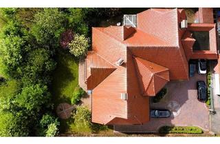 Einfamilienhaus kaufen in 26219 Bösel, Bösel - PLATZWUNDER - 1 Haus oder 2 Einheiten mit insgesamt 409 m² Wfl. unter einem Dach!