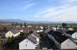 Wohnung kaufen in 79312 Emmendingen, Vier Berge auf einen Blick – Wohnen über den Dächern von Emmendingen