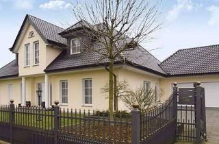 Villa kaufen in 49076 Atter, Neuwertige Villa mit moderner Ausstattung und schön angelegtem Garten