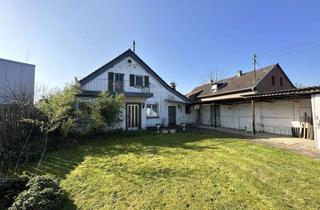 Einfamilienhaus kaufen in 47877 Willich, Einfamilienhaus mit viel Potenzial und freiem Bauplatz in Willich-Anrath
