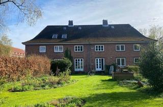 Haus kaufen in 24837 Schleswig, Charmantes Reihenmittelhaus mit Charakter und großem Garten zentral gelegen