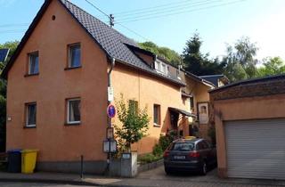 Einfamilienhaus kaufen in 56659 Burgbrohl, Einfamilienhaus mit separater Einliegerwohnung - Innenhof und Garage