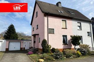 Haus kaufen in 47495 Rheinberg, Tolles "Familiennest" mit idyllischem Garten, Garage + Ausbaumöglichkeit