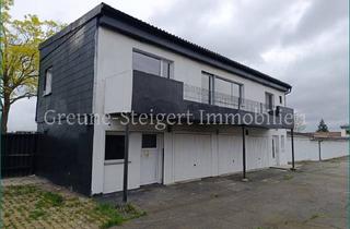 Haus kaufen in 38304 Wolfenbüttel, Wolfenbüttel - *** Zentrale Lage - Garagenhof mit 17 Garagen und einer Dreizimmerwohnung