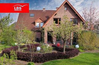 Einfamilienhaus kaufen in 49134 Wallenhorst, Exklusives Wohnerlebnis in WH-Hollage: Einfamilienhaus mit ELW