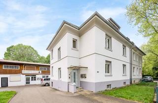 Doppelhaushälfte kaufen in 76532 Oos, Vielseitiges Wohnen in Baden-Baden: Zwei Wohnungen in sanierter Doppelhaushälfte und großem Neben...