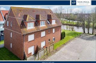 Wohnung kaufen in 26553 Dornum, Schöne Eigentumswohnung mit Blick auf den Deich und den Kanal in ruhiger Lage von Dornumersiel!