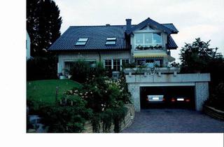 Haus kaufen in 33829 Borgholzhausen, Borgholzhausen - Einfamilienwohnhaus mit Einliegerwohnung und Büro in Borgholzhaus