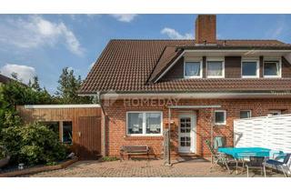 Haus kaufen in 26683 Saterland, Charmante DHH mit Kamin, Garten und Stellplatz
