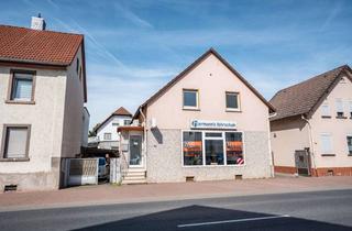 Mehrfamilienhaus kaufen in Friedberger Straße 47, 61118 Bad Vilbel, "Interessantes Mehrfamilienhaus mit zwei Wohnungen und Gewerbefläche - Ihr neues Investment!"