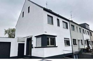 Haus kaufen in 40667 Meerbusch, Sanierungsbedürftiges Reihenendhaus In Meerbusch-Büderich