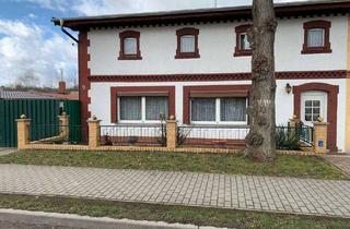 Doppelhaushälfte kaufen in Dorfstr., 16306 Zichow, Zichow - Doppelhaushälfte mit Nebengebäude und großem Garten