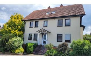 Haus kaufen in 36396 Steinau, Geräumiges Haus mit Nebengebäude und Garagen auf großem Grundstück in Steinau-Sarrod