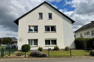 Haus kaufen in 32257 Bünde, Attraktives 3-Familienhaus direkt am Feld: Ideales Investment für Kapitalanleger!