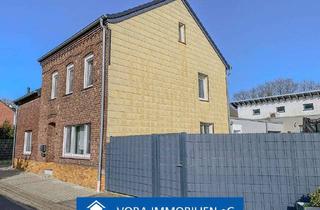 Haus kaufen in 41836 Hückelhoven, Hinter schlichter Fassade top modernisiert!