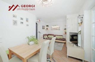 Wohnung kaufen in 85630 Grasbrunn, Sonnige Gartenwohnung über drei Etagen