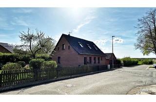 Haus kaufen in 29690 Schwarmstedt, Schwarmstedt - Kleines Haus mit viel Nutzfläche, Doppelgarage und schönem Garten! (SY-6254)
