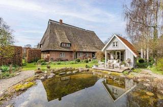 Bauernhaus kaufen in 23738 Beschendorf, Ein beeindruckendes Anwesen, umgeben von gepflegter Natur und einer Architektur, die eine Exklusivität in jedem Detail wiederspiegelt