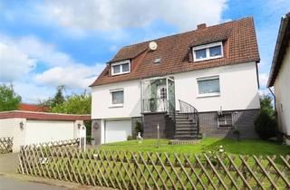 Einfamilienhaus kaufen in 34266 Niestetal, Niestetal - Provisionsfrei - Geräumiges Einfamilienhaus mit Baugrundstück in ruhiger Lage in Niestetal-S.