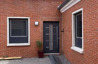 Wohnung kaufen in Hauptstraße 50a, 26524 Hage, Barrierefreie Seniorenwohnung im EG mit Terrasse und Garten