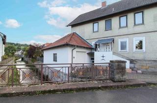 Anlageobjekt in 36157 Ebersburg, Für Ihre große Familie: Renovierungsbedürftiges Einfamilienhaus in zentraler Ortslage von Schmalnau