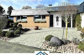 Haus kaufen in 50374 Erftstadt, Winkelbungalow mit Garage und idyllischem Garten im Herzen von Lechenich zu verkaufen - 10 Fußminute