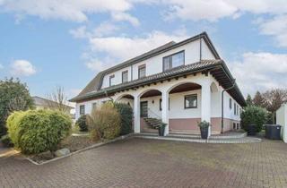 Mehrfamilienhaus kaufen in 64521 Groß-Gerau, Groß-Gerau - Gehoben und gepflegt: MFH mit 3 Wohneinheiten und Garten in familienfreundlicher Lage von Dornheim