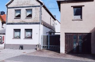 Einfamilienhaus kaufen in 37339 Breitenworbis, Breitenworbis - Wohnhaus mit eigenem Hof und Garage für 2 Autos