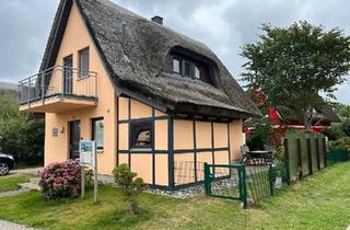 Haus kaufen in 18546 Sassnitz, Sassnitz - Reetdachhaus mit Boddenblick Sauna Kamin Motorboot