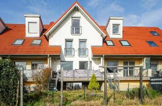 Wohnung kaufen in 55291 Saulheim, Nicht das Übliche! Sehr große Maisonettewohnung mit kleinem Garten im Stil eines Reihenmittelhauses.