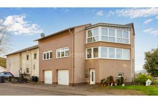 Haus kaufen in 54453 Nittel, Beeindruckendes MFH mit 2 Wohnungen, 2 Garagen und Garten in malerischer Lage