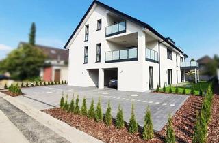 Wohnung kaufen in 33332 Gütersloh, Gütersloh - Lichtdurchflutetes Wohnen im Dachgeschoss: Moderne Neubauwohnung mit Charme