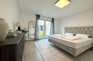 Wohnung kaufen in 68219 Rheinau, Luxuriöse 4-Zimmer Erdgeschosswohnung mit Garten & Stellplatz