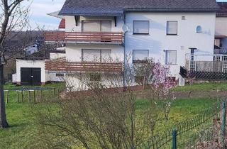 Haus kaufen in 56370 Attenhausen, Gepflegtes Zwei-Dreifamilienhaus mit toller Aussicht in idyllischer Ortsrandlage