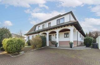 Haus kaufen in 64521 Groß-Gerau, Gehoben und gepflegt: MFH mit 3 Wohneinheiten und Garten in familienfreundlicher Lage von Dornheim