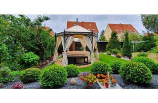 Wohnung kaufen in 06449 Aschersleben, Eigentumswohnung mit Gartengrundstück